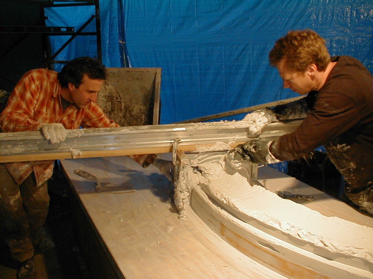 Interior construction detail — finish plaster and trim installation